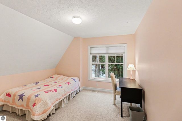 7380 Deepwater Point Road, Williamsburg, MI 49690