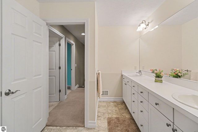 7380 Deepwater Point Road, Williamsburg, MI 49690