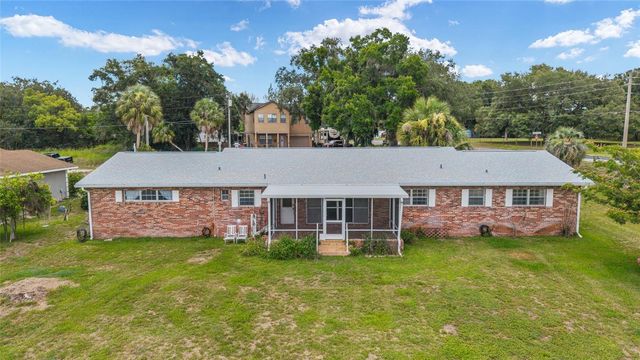 35237 MULHOLLAND DRIVE, Fruitland Park, FL 34731
