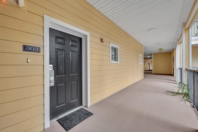 9051 TREASURE TROVE LANE 303, Kissimmee, FL 34747