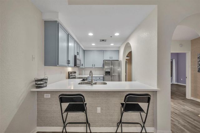 9051 TREASURE TROVE LANE 303, Kissimmee, FL 34747