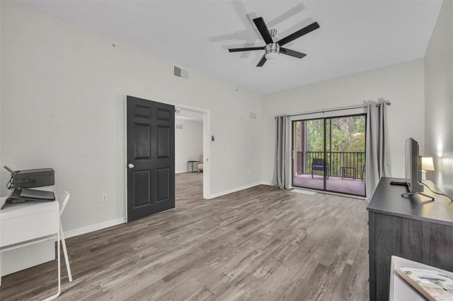 9051 TREASURE TROVE LANE 303, Kissimmee, FL 34747