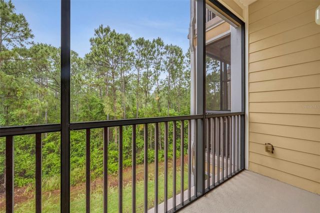 9051 TREASURE TROVE LANE 303, Kissimmee, FL 34747