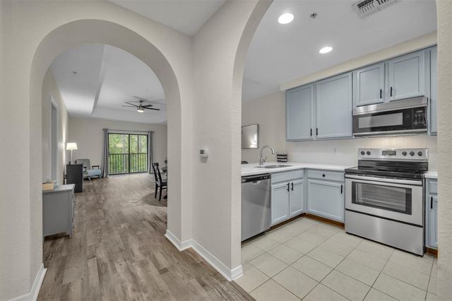 9051 TREASURE TROVE LANE 303, Kissimmee, FL 34747