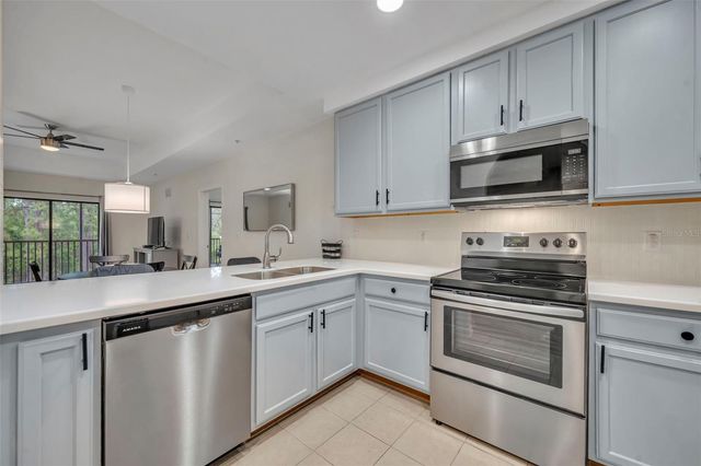 9051 TREASURE TROVE LANE 303, Kissimmee, FL 34747
