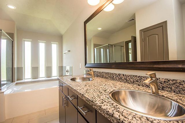 63 Aventura Place, The Woodlands, TX 77389