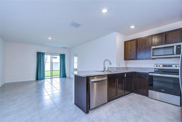 5460 WARRINGTON TOWN PATH, Wesley Chapel, FL 33545