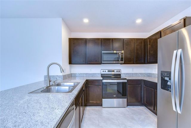 5460 WARRINGTON TOWN PATH, Wesley Chapel, FL 33545