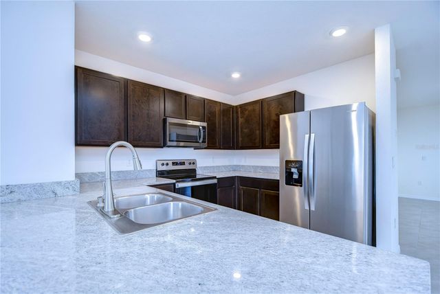 5460 WARRINGTON TOWN PATH, Wesley Chapel, FL 33545