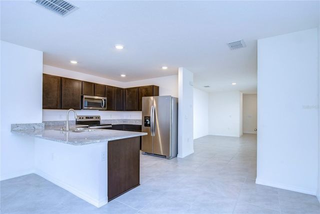 5460 WARRINGTON TOWN PATH, Wesley Chapel, FL 33545