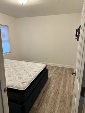 7110 S Champlain Avenue, Chicago, IL 60619