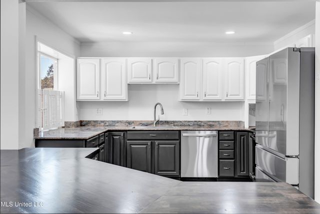 8828 Manoo Place, Diamondhead, MS 39525