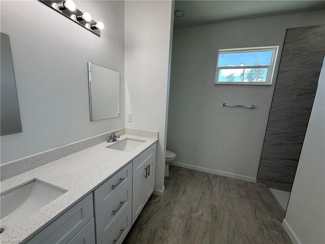 1115 Cove ST E, Lehigh Acres, FL 33974