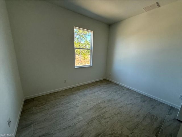 1115 Cove ST E, Lehigh Acres, FL 33974