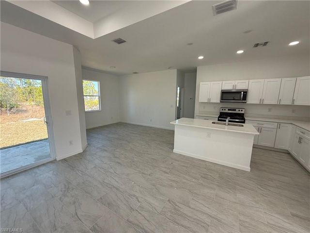 1115 Cove ST E, Lehigh Acres, FL 33974