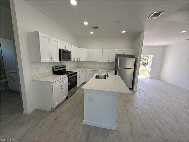 1115 Cove ST E, Lehigh Acres, FL 33974