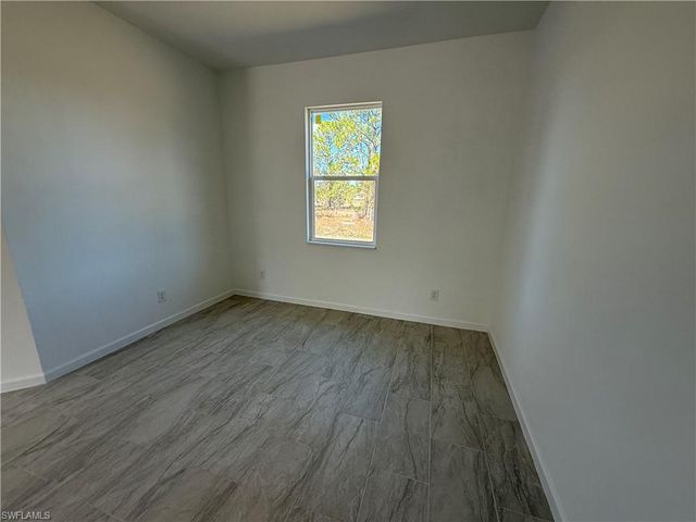 1115 Cove ST E, Lehigh Acres, FL 33974