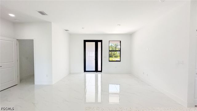 704 Asher ST E, Lehigh Acres, FL 33974