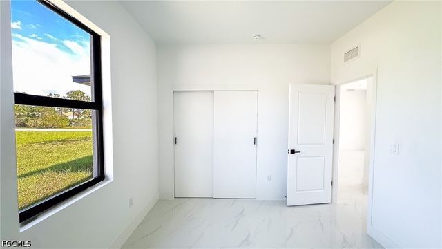 704 Asher ST E, Lehigh Acres, FL 33974