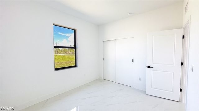 704 Asher ST E, Lehigh Acres, FL 33974