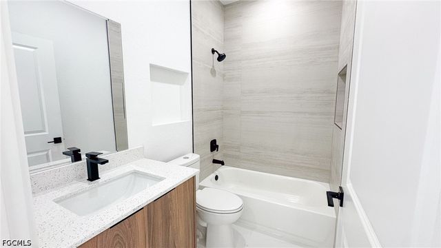 704 Asher ST E, Lehigh Acres, FL 33974