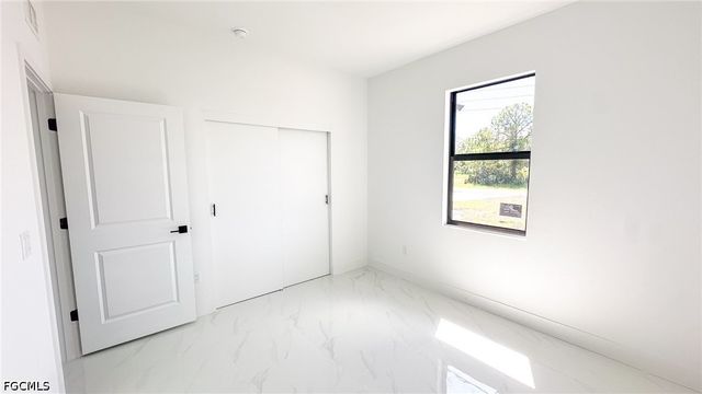 704 Asher ST E, Lehigh Acres, FL 33974