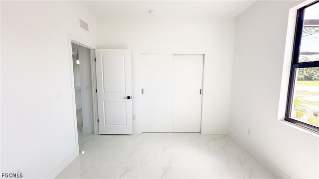 704 Asher ST E, Lehigh Acres, FL 33974