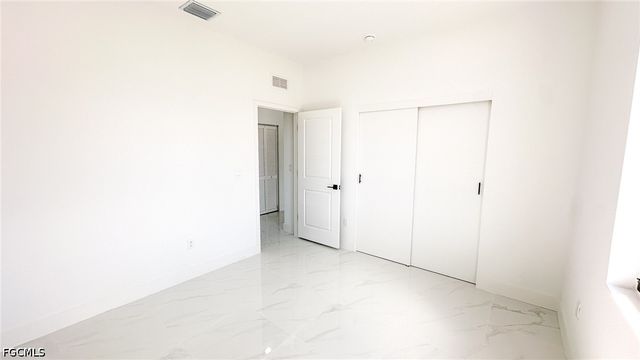 704 Asher ST E, Lehigh Acres, FL 33974