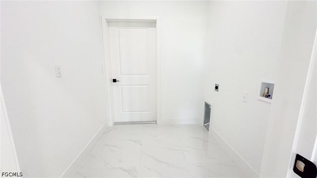 704 Asher ST E, Lehigh Acres, FL 33974