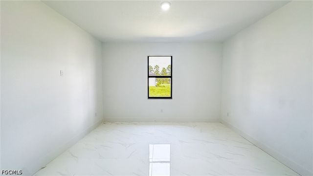 704 Asher ST E, Lehigh Acres, FL 33974