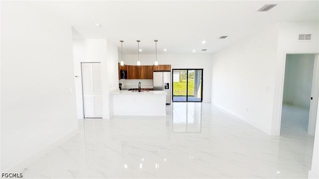 704 Asher ST E, Lehigh Acres, FL 33974