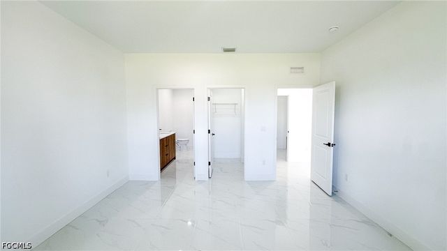 704 Asher ST E, Lehigh Acres, FL 33974