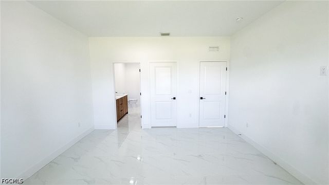 704 Asher ST E, Lehigh Acres, FL 33974