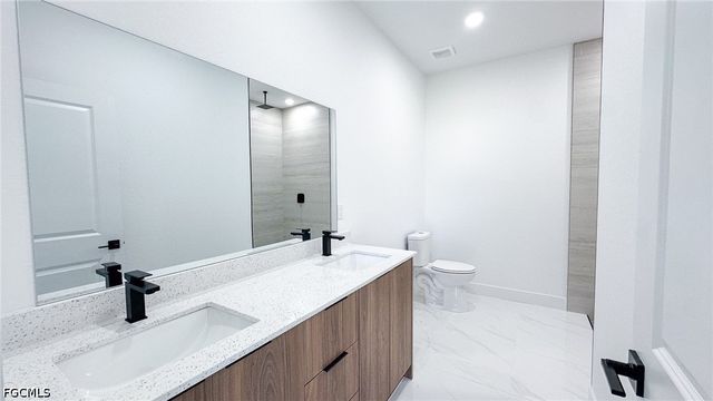 704 Asher ST E, Lehigh Acres, FL 33974