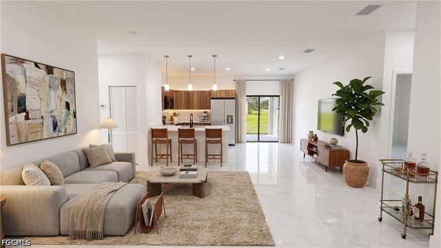 704 Asher ST E, Lehigh Acres, FL 33974