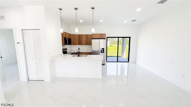 704 Asher ST E, Lehigh Acres, FL 33974