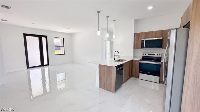 704 Asher ST E, Lehigh Acres, FL 33974