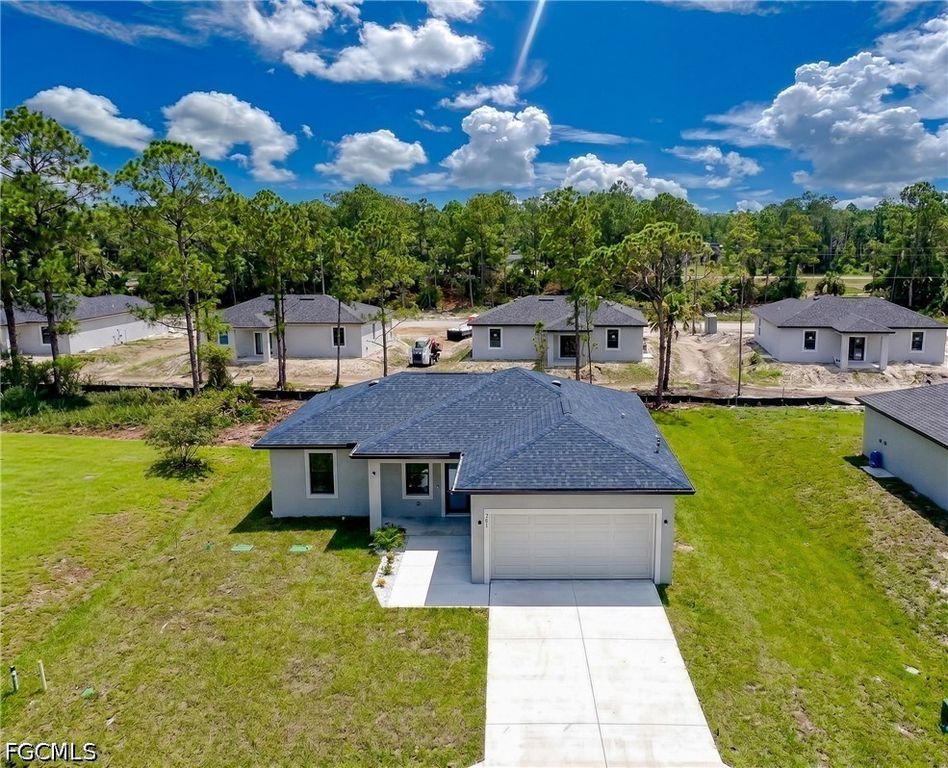 704 Asher ST E, Lehigh Acres, FL 33974