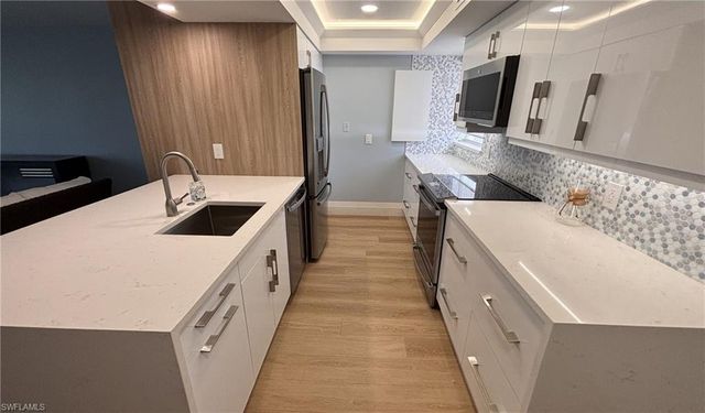 300 Park Shore DR 1B, Naples, FL 34103