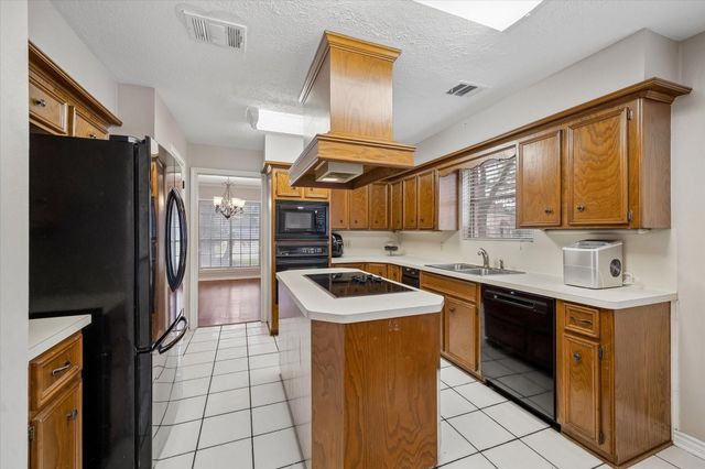 14615 Oak Bluff Court, Houston, TX 77070