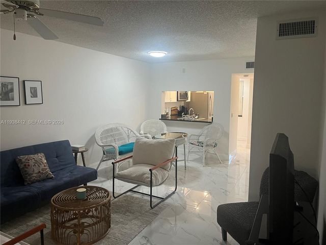 10402 Sunrise Lakes Boulevard 107, Sunrise, FL 33322