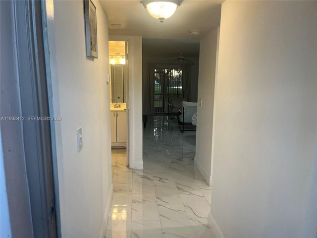 10402 Sunrise Lakes Boulevard 107, Sunrise, FL 33322