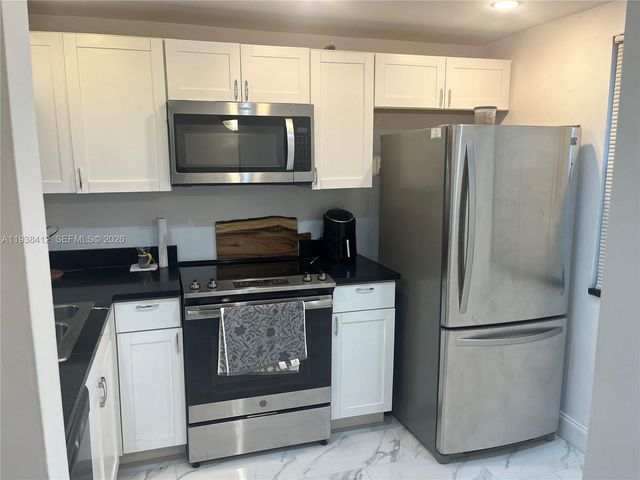 10402 Sunrise Lakes Boulevard 107, Sunrise, FL 33322