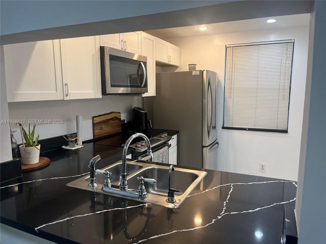 10402 Sunrise Lakes Boulevard 107, Sunrise, FL 33322