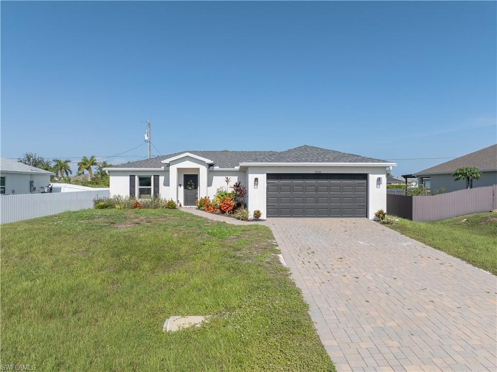 1820 NW 1st AVE, CAPE CORAL, FL 33993 — exterior