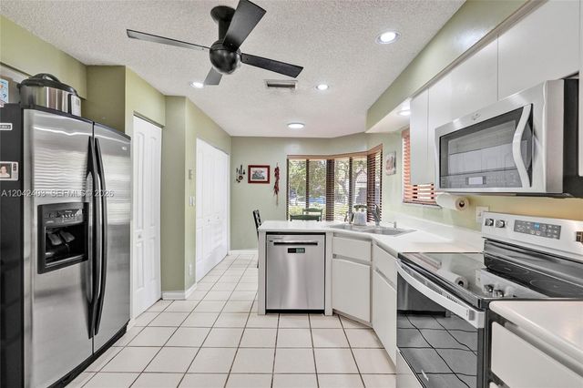 9355 NW 18th Place, Plantation, FL 33322