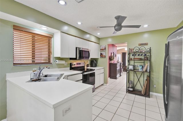 9355 NW 18th Place, Plantation, FL 33322