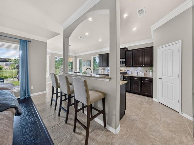 79 W Wading Pond Circle, The Woodlands, TX 77375