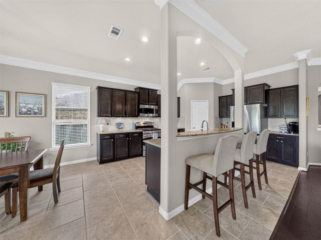 79 W Wading Pond Circle, The Woodlands, TX 77375