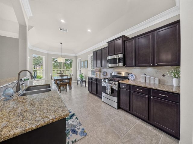 79 W Wading Pond Circle, The Woodlands, TX 77375